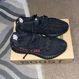 Black men yeezy sneakers gently used.